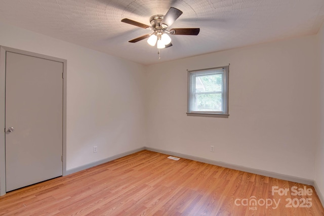 1715 Nelson Dr, Newton, NC 28658 - empty room with light wood-style flooring and ceiling fan