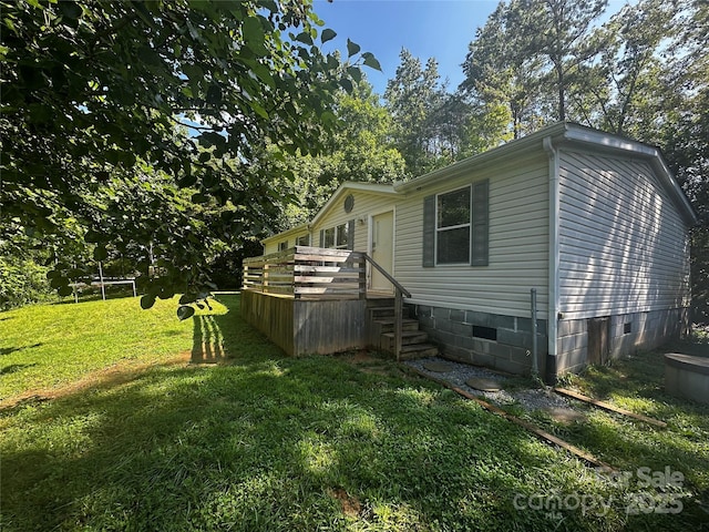 584 Ebenezer Rd, Old Fort, NC 28762 - view of side of home with a lawn, crawl space, and a deck