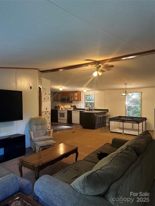 584 Ebenezer Rd, Old Fort, NC 28762 - living area with carpet floors and a ceiling fan