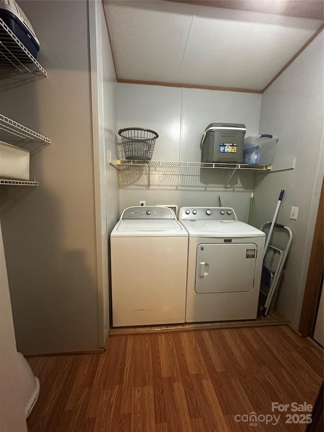584 Ebenezer Rd, Old Fort, NC 28762 - washroom with wood finished floors and washing machine and clothes dryer