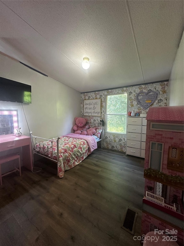 584 Ebenezer Rd, Old Fort, NC 28762 - bedroom with wood finished floors, a textured ceiling, and lofted ceiling
