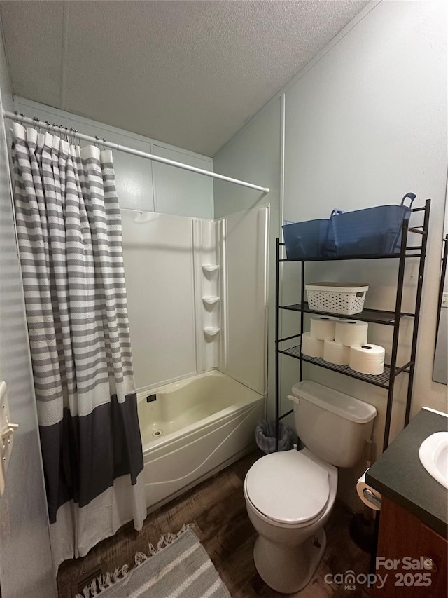 584 Ebenezer Rd, Old Fort, NC 28762 - bathroom with wood finished floors, shower / bath combo, vanity, and a textured ceiling