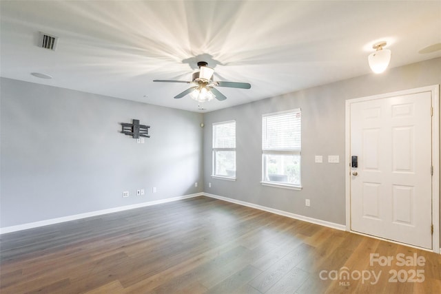 8225 Midas Ln, Locust, NC 28097 - entryway with ceiling fan and wood finished floors