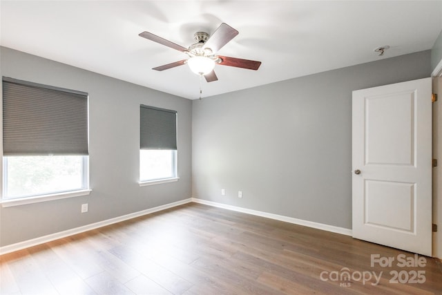 8225 Midas Ln, Locust, NC 28097 - unfurnished room featuring wood finished floors, ceiling fan, and fire sprinkler in ceiling