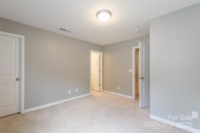 8225 Midas Ln, Locust, NC 28097 - unfurnished bedroom featuring baseboards and light colored carpet