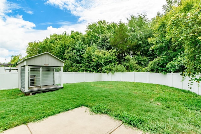 8225 Midas Ln, Locust, NC 28097 - fenced backyard featuring an outbuilding
