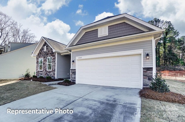 3238 Bozeman Ct Unit 07, Denver, NC 28164 - craftsman house with stone siding, concrete driveway, and a garage