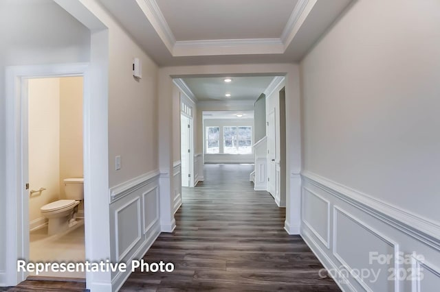 3238 Bozeman Ct Unit 07, Denver, NC 28164 - hall featuring a decorative wall, crown molding, dark wood-style floors, and a wainscoted wall