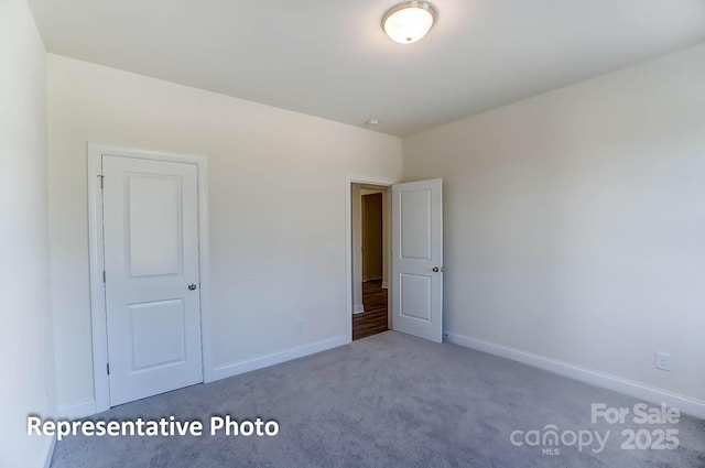 3238 Bozeman Ct Unit 07, Denver, NC 28164 - unfurnished bedroom with carpet floors and baseboards