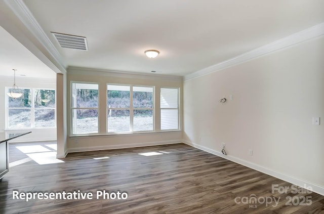 3238 Bozeman Ct Unit 07, Denver, NC 28164 - spare room featuring crown molding and dark wood-type flooring
