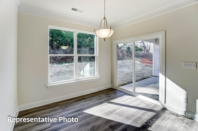 3238 Bozeman Ct Unit 07, Denver, NC 28164 - unfurnished dining area with ornamental molding, healthy amount of natural light, and wood finished floors