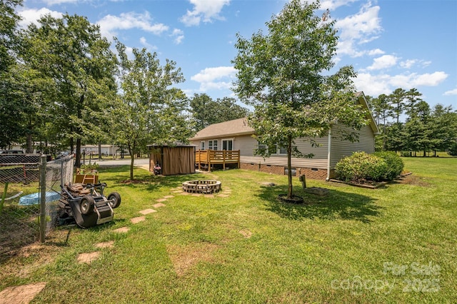 5602 Flint Ridge Church Rd, Marshville, NC 28103 - view of yard featuring an outdoor fire pit and a deck