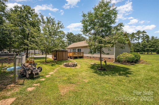 5602 Flint Ridge Church Rd, Marshville, NC 28103 - view of yard featuring an outdoor fire pit and a deck