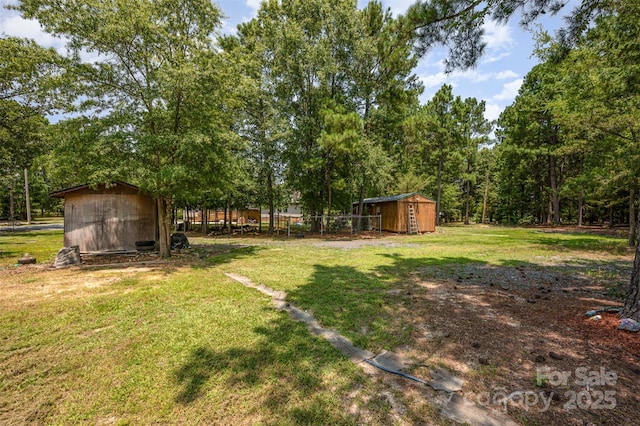 5602 Flint Ridge Church Rd, Marshville, NC 28103 - view of grassy yard with a storage shed