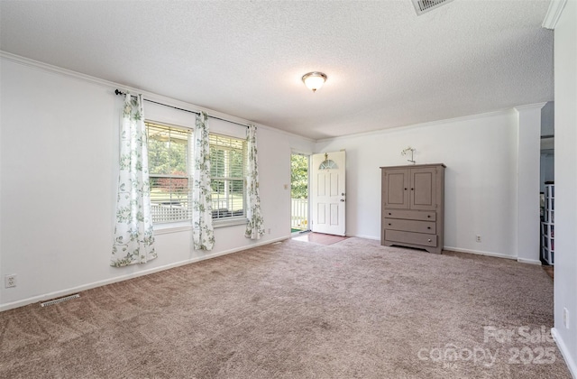 5602 Flint Ridge Church Rd, Marshville, NC 28103 - empty room with crown molding, carpet floors, and a textured ceiling