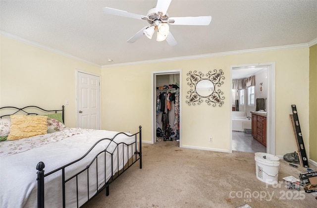5602 Flint Ridge Church Rd, Marshville, NC 28103 - bedroom with crown molding, light carpet, a spacious closet, ensuite bathroom, and ceiling fan