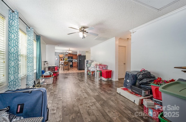 5602 Flint Ridge Church Rd, Marshville, NC 28103 - playroom featuring wood finished floors, ceiling fan, attic access, a textured ceiling, and crown molding