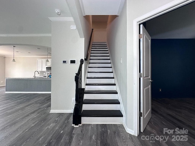 764 River Park Rd, Belmont, NC 28012 - stairway featuring wood finished floors and ornamental molding