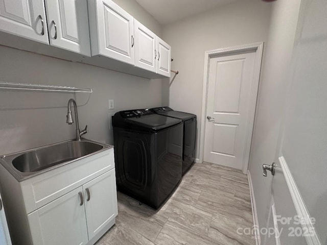 764 River Park Rd, Belmont, NC 28012 - washroom featuring separate washer and dryer and cabinet space