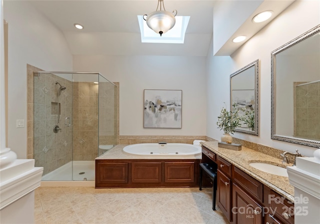 3015 Stanbury Dr, Matthews, NC 28104 - full bath featuring a skylight, vanity, a bath, a shower stall, and vaulted ceiling