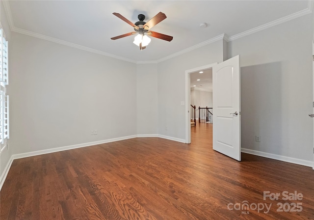 3015 Stanbury Dr, Matthews, NC 28104 - empty room featuring a ceiling fan, crown molding, wood finished floors, and a smoke detector