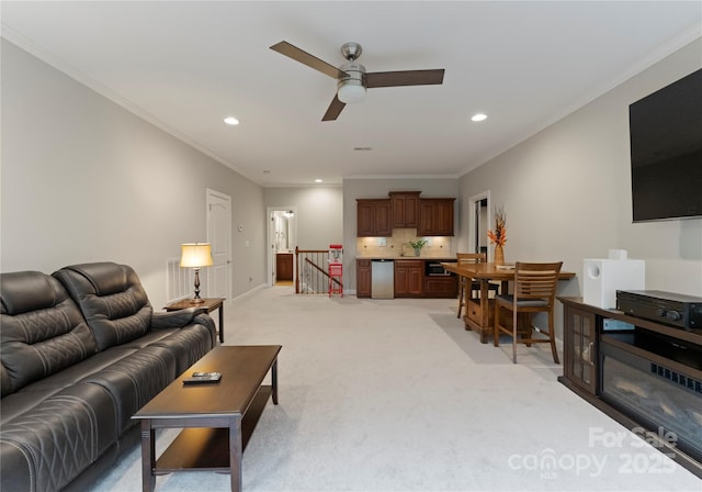 3015 Stanbury Dr, Matthews, NC 28104 - living area featuring ceiling fan, light carpet, ornamental molding, and recessed lighting