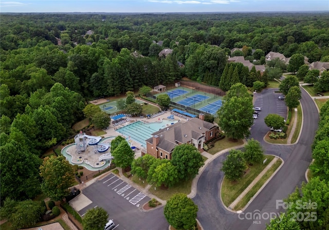 3015 Stanbury Dr, Matthews, NC 28104 - bird's eye view of a heavily wooded area and a pool area