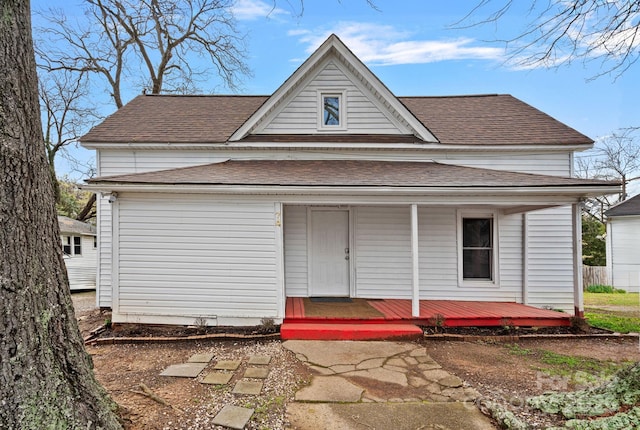 74 Meadow Ave, Concord, NC 28025 - view of front of house featuring a shingled roof and covered porch