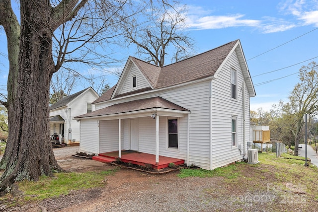 74 Meadow Ave, Concord, NC 28025 - view of front facade with a shingled roof and a porch