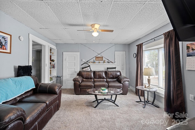 74 Meadow Ave, Concord, NC 28025 - living area with carpet, ceiling fan, built in features, and a drop ceiling