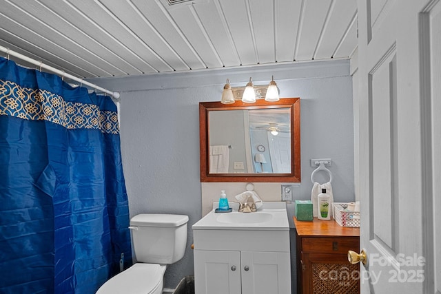 74 Meadow Ave, Concord, NC 28025 - bathroom featuring vanity, a textured wall, and a shower with shower curtain