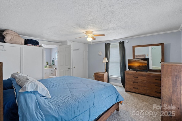 74 Meadow Ave, Concord, NC 28025 - bedroom featuring carpet flooring, crown molding, a textured ceiling, ceiling fan, and ensuite bathroom