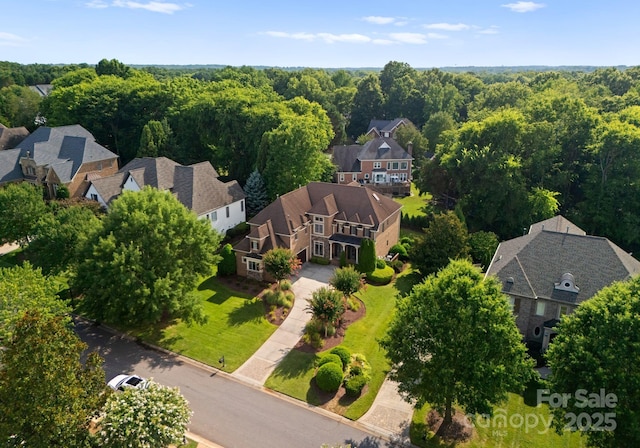 202 Montrose Dr, Waxhaw, NC 28173 - aerial view of residential area with a heavily wooded area