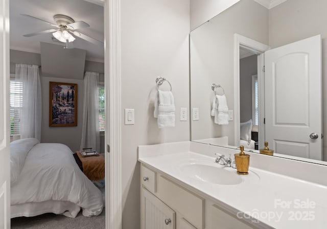 202 Montrose Dr, Waxhaw, NC 28173 - ensuite bathroom featuring vanity, plenty of natural light, a ceiling fan, and ornamental molding