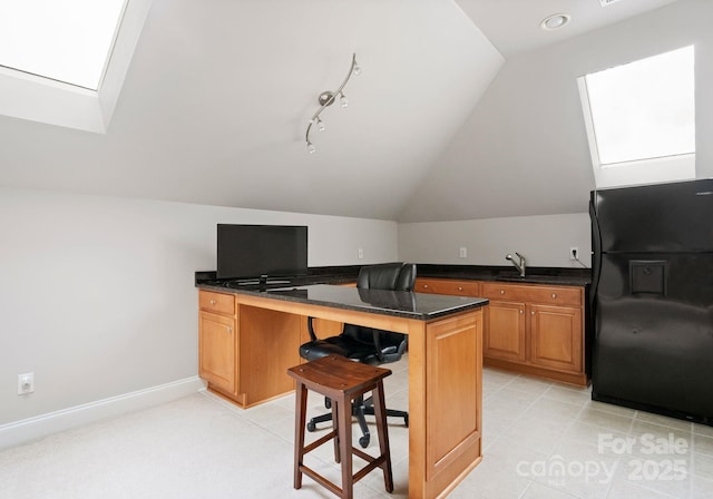 202 Montrose Dr, Waxhaw, NC 28173 - office space featuring a skylight and lofted ceiling