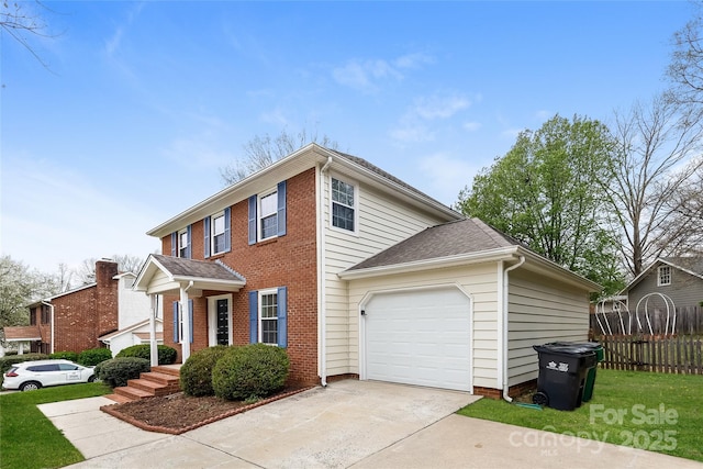 8749 Rittenhouse Cir, Charlotte, NC 28270 - colonial home with an attached garage, concrete driveway, and brick siding