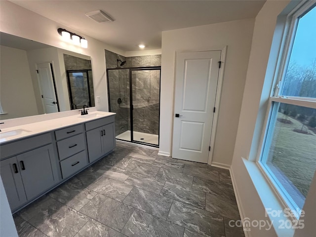 435 Lancashire Ct, Denver, NC 28037 - bathroom with a shower stall, double vanity, and marble finish flooring