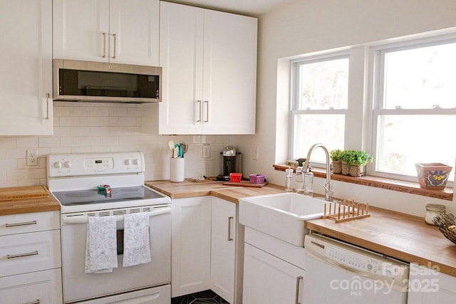 355 Walnut Ave, Spruce Pine, NC 28777 - kitchen featuring white appliances, butcher block counters, and white cabinetry