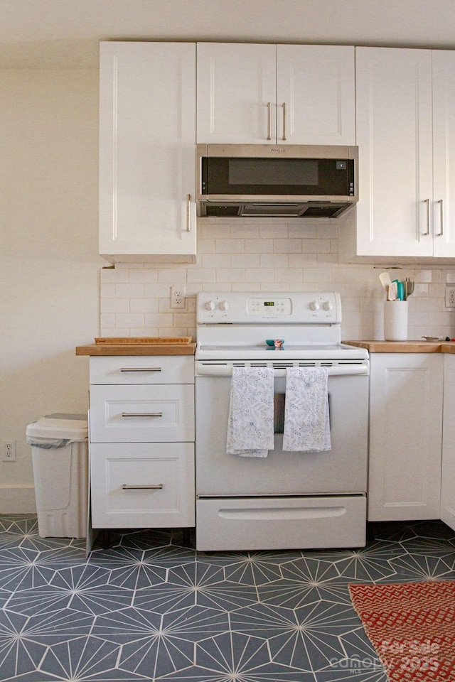 355 Walnut Ave, Spruce Pine, NC 28777 - kitchen featuring electric stove, white cabinets, and decorative backsplash