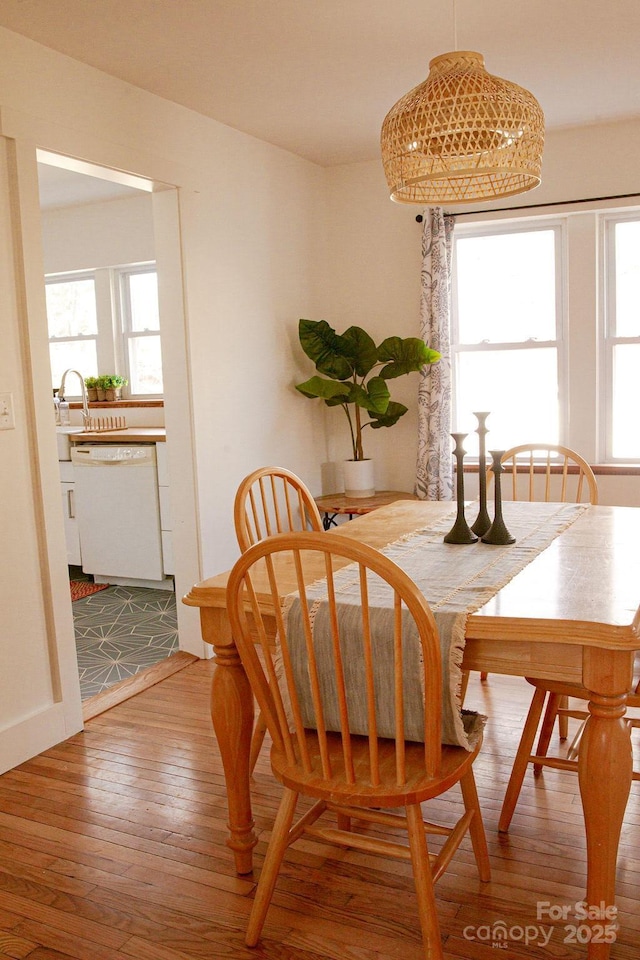 355 Walnut Ave, Spruce Pine, NC 28777 - dining room with healthy amount of natural light and hardwood / wood-style flooring
