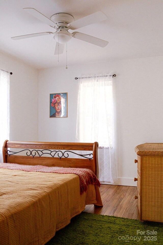 355 Walnut Ave, Spruce Pine, NC 28777 - bedroom with wood finished floors and a ceiling fan