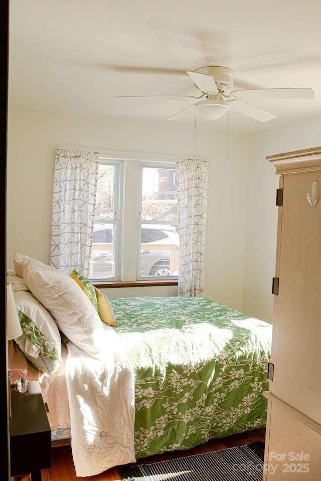 355 Walnut Ave, Spruce Pine, NC 28777 - bedroom with a ceiling fan and wood finished floors