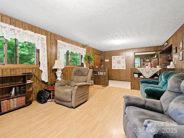1400 Watershed Rd, Mars Hill, NC 28754 - living room with wooden walls, wood finished floors, and a textured ceiling
