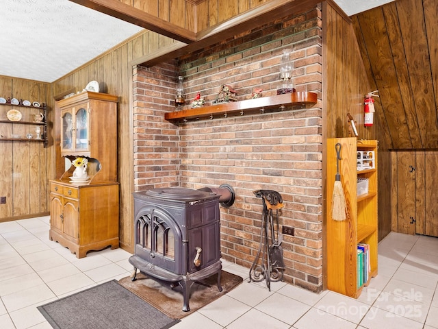 1400 Watershed Rd, Mars Hill, NC 28754 - detailed view of a wood stove, wooden walls, and a textured ceiling