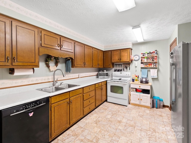 1400 Watershed Rd, Mars Hill, NC 28754 - kitchen with dishwasher, electric stove, freestanding refrigerator, light countertops, and brown cabinets