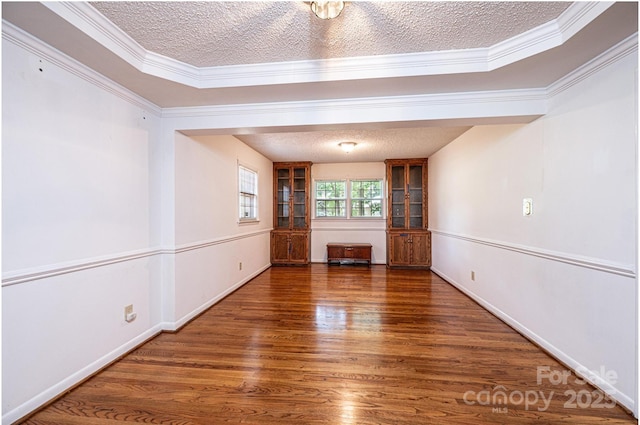 3781 Dover St, Claremont, NC 28610 - spare room with a textured ceiling, wood finished floors, and ornamental molding