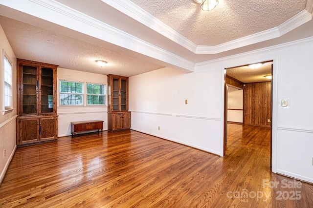 3781 Dover St, Claremont, NC 28610 - unfurnished room featuring a textured ceiling, wood finished floors, and ornamental molding