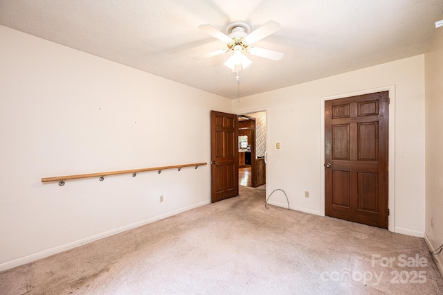 3781 Dover St, Claremont, NC 28610 - unfurnished room with light carpet and a ceiling fan