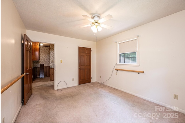 3781 Dover St, Claremont, NC 28610 - unfurnished bedroom featuring light colored carpet and ceiling fan