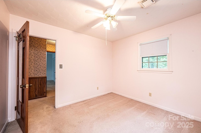 3781 Dover St, Claremont, NC 28610 - unfurnished room with light carpet and a ceiling fan